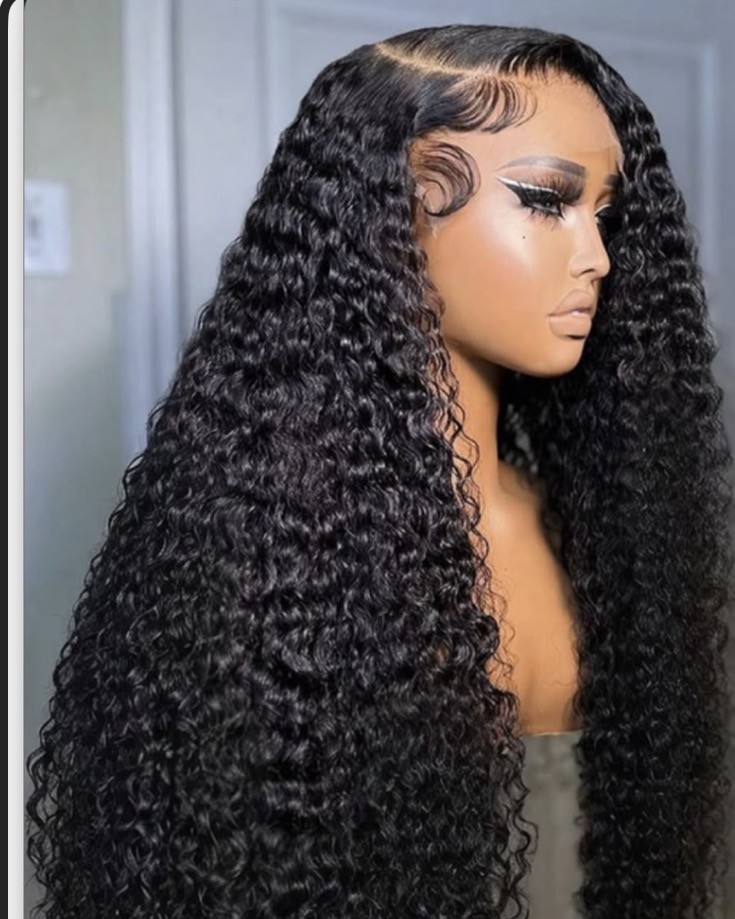 24 inch sdd pixie curls unit in profile, shown on a display mannequin